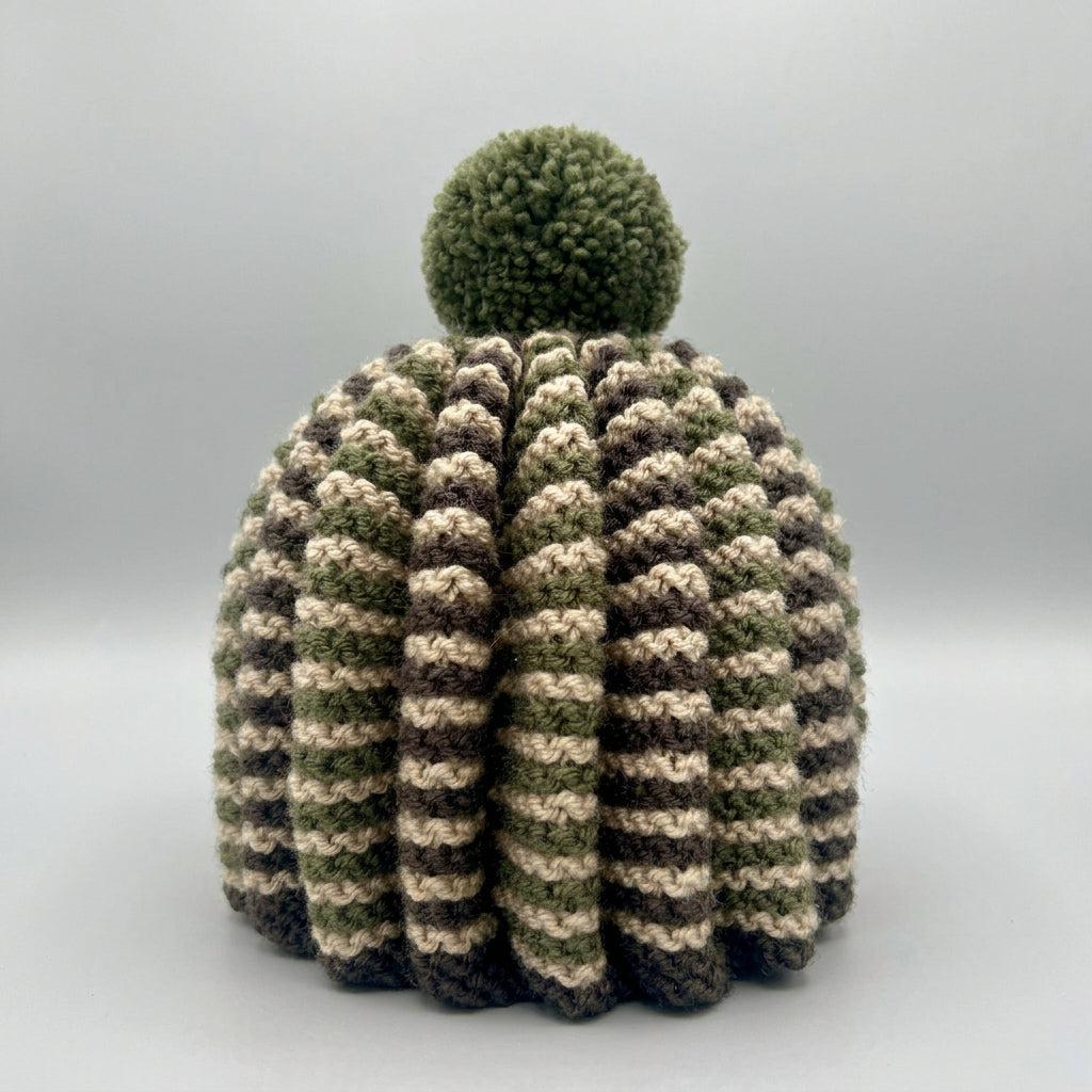 A hand knitted tea cosy